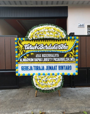Papan Bunga Duka di Sigedong